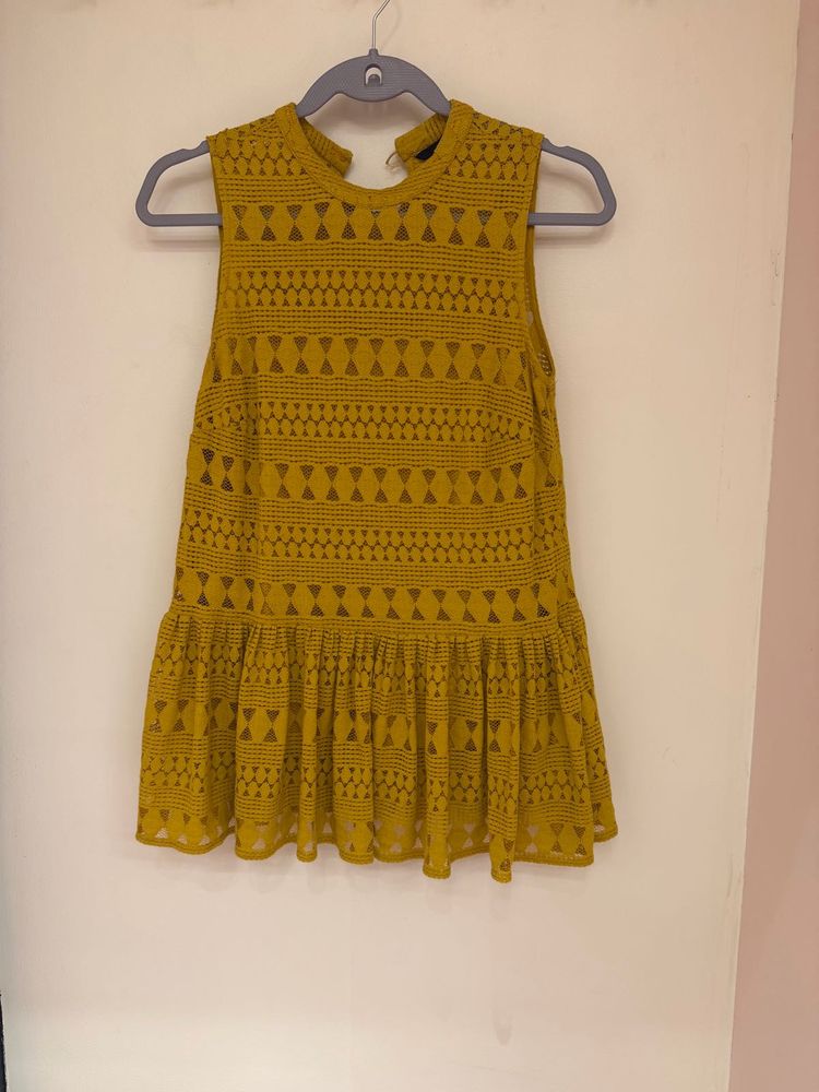 Sleeveless high neck top with slip