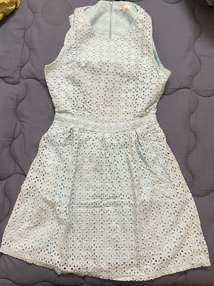 Beautiful Pastel Blue Dress With Back Styling Cut