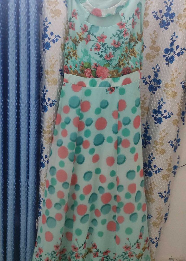 It&#39;s a pure georgette sleeveless floral gown