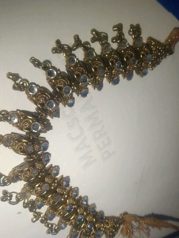 a golden colour necklace