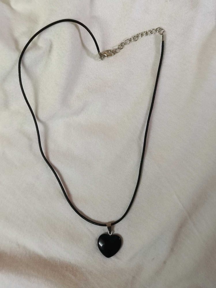 Black Heard Shaped Pendant And Faux Leather Chair
