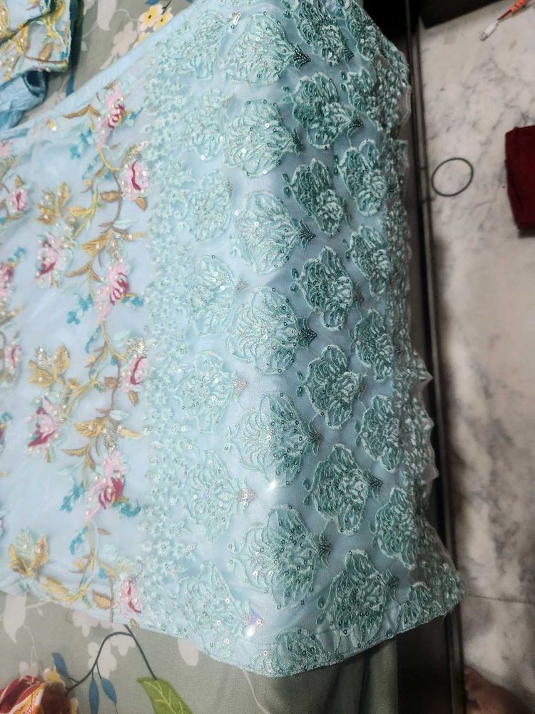 A Very Graceful Sky Blue Colour Pakistai Suit