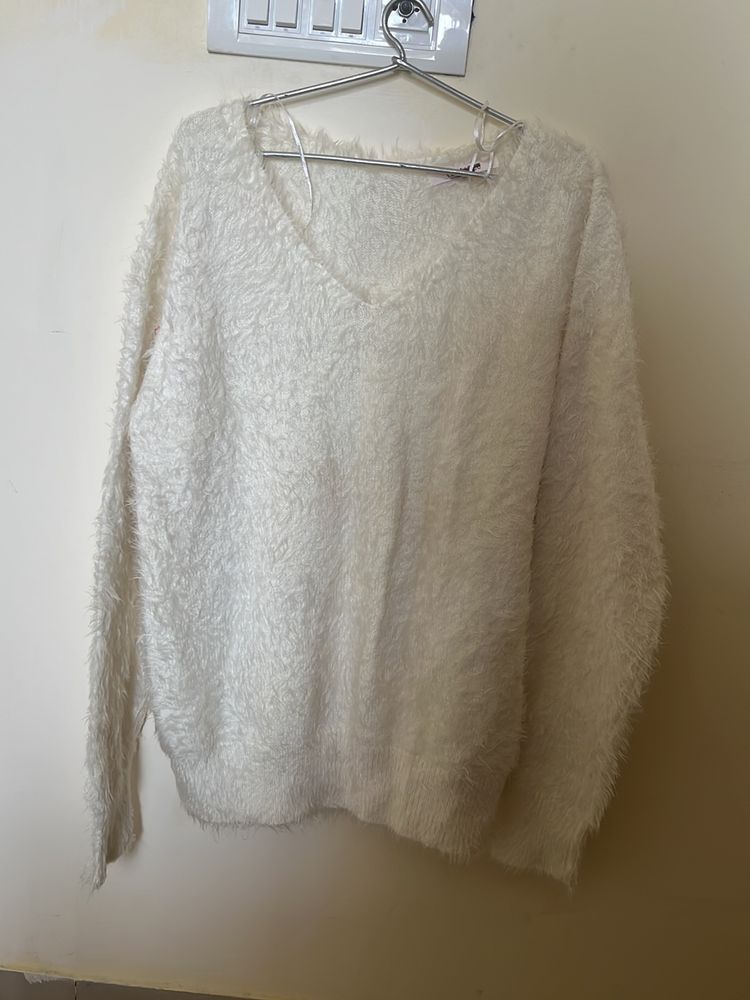 big white fuzzy sweater