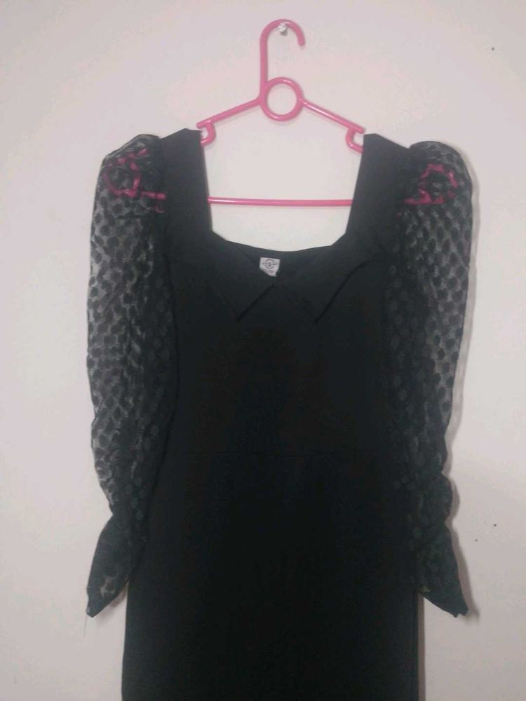 WomenMid Length Frock With Netted Puff Hand Sleeve