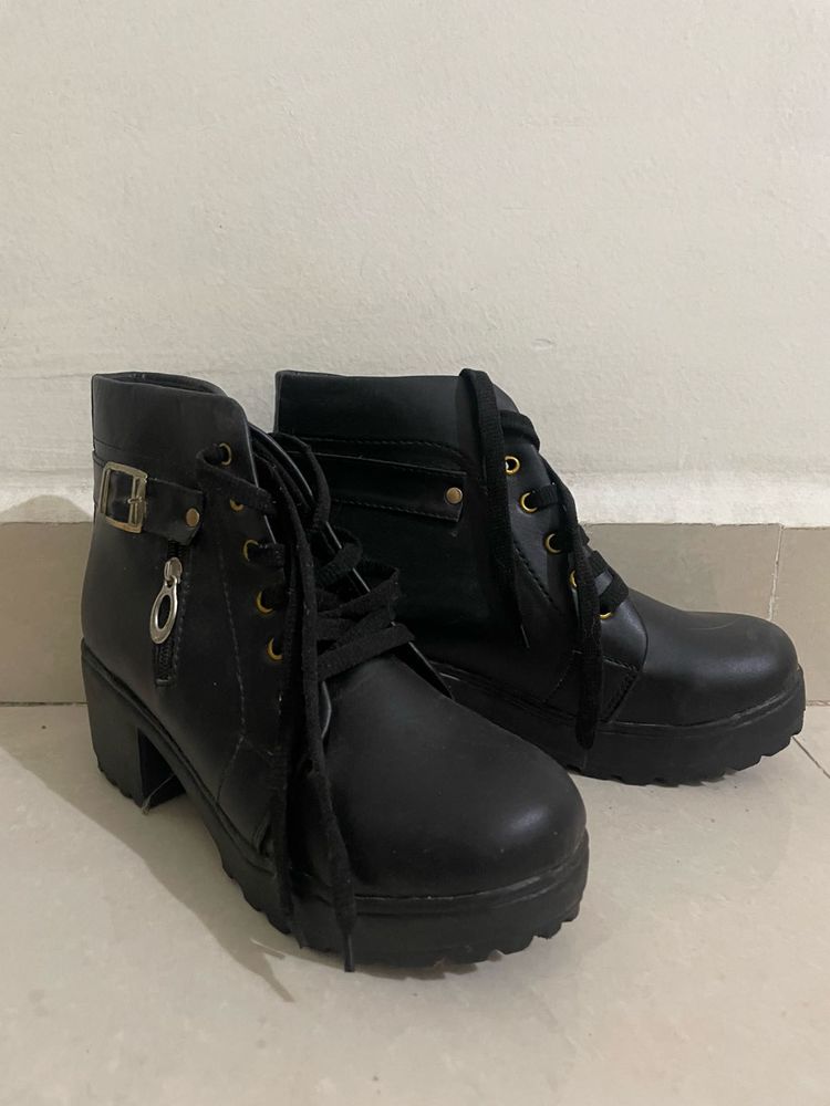 Black leather boots