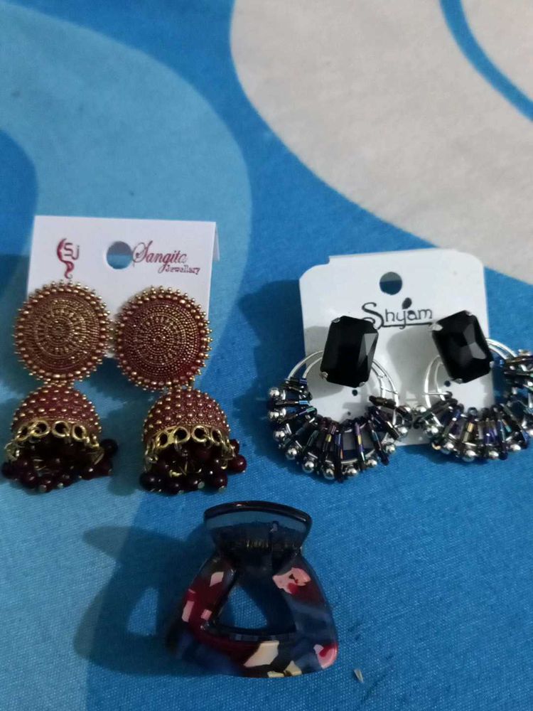 Two sets of Earrings and a small coral clip!