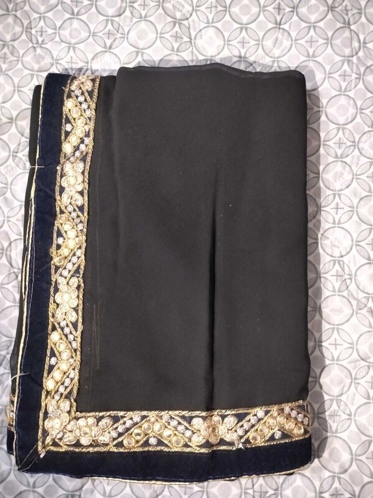 Elegant Black Saree with Gold Embroidery
