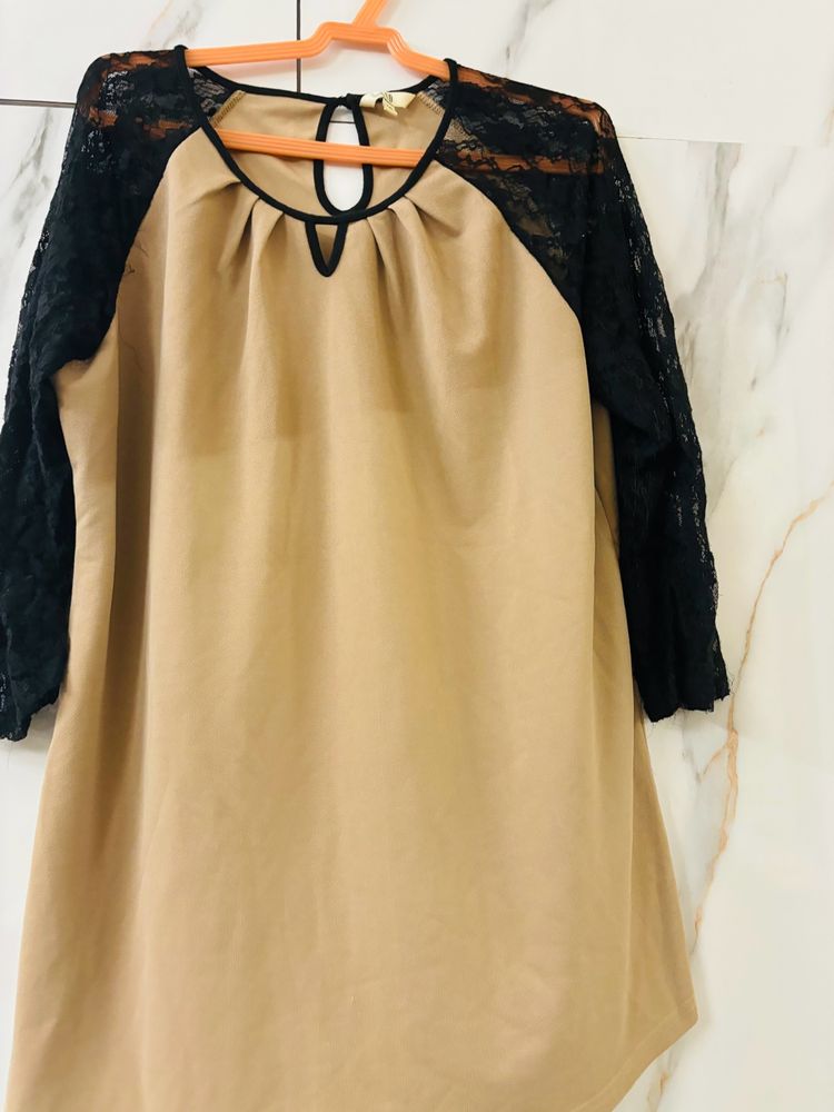 Beige Top With Black Net Sleeves