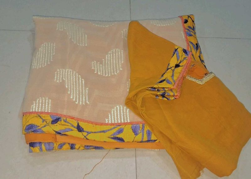 Ethnic mustard and cream saree