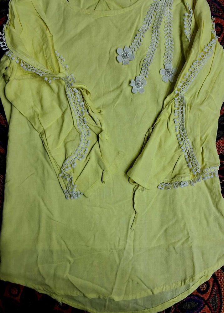 Selling A Light Yellow Colour Full Size Top.