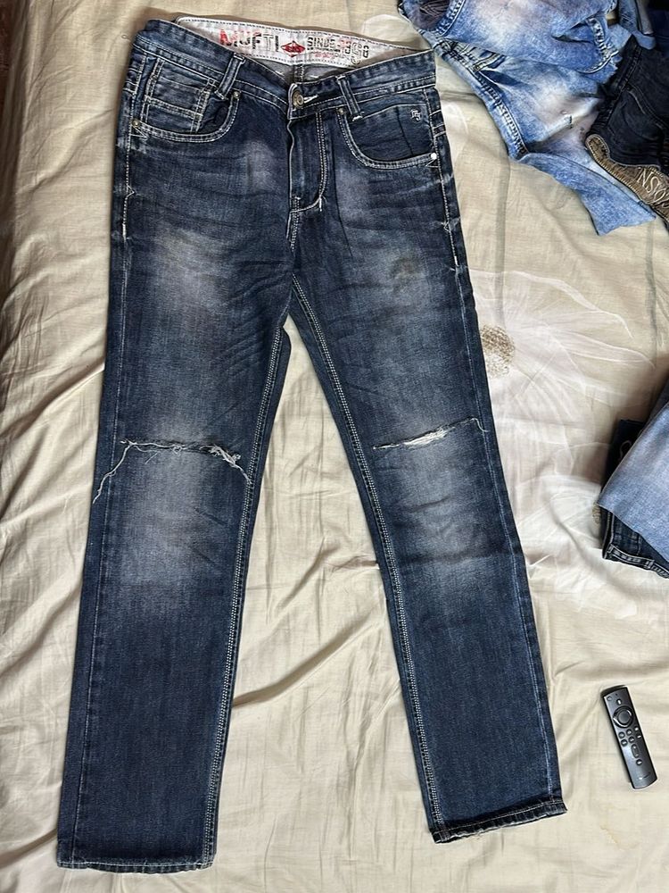 Ripped Blue Denim Jeans