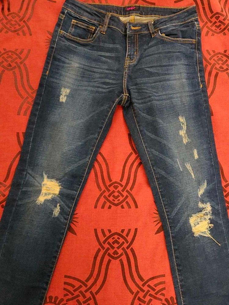 Distressed Denim Jeans