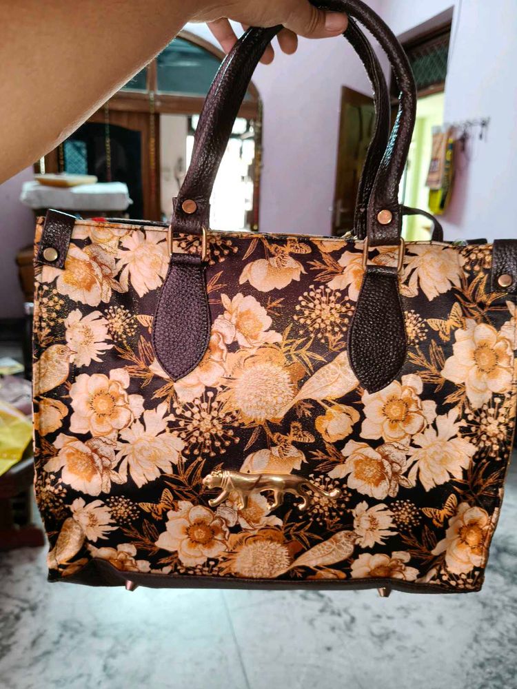 Elegant Floral Handbag with Golden Panther Accent