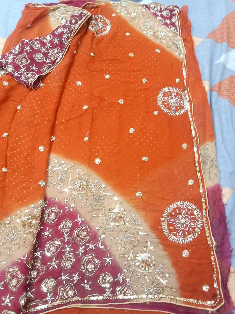 Orange embroidered saree