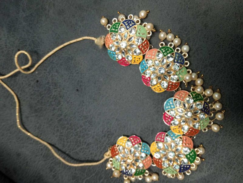 Boutique Set Neckpiece With Jhumka And Tika.