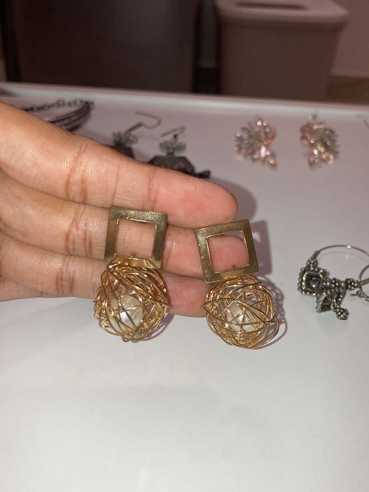 Gold Pearl In Sphere Earrings