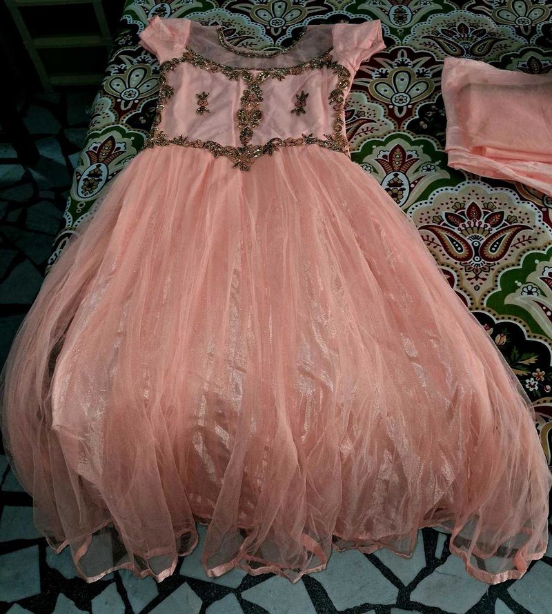 90% Off 💥 Barbie Peach Net Heavy Gown With Stones