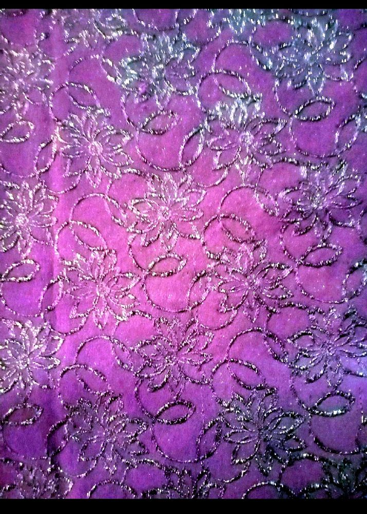 A Purple Colour Saree With Blouse