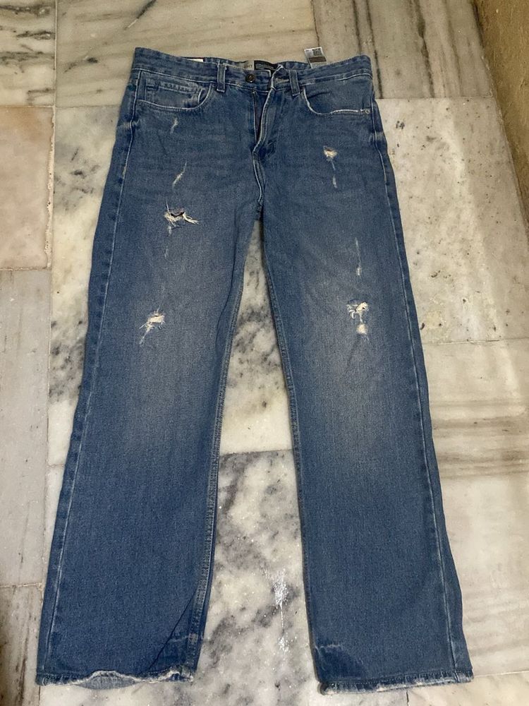 Distressed Wide-Leg Jeans