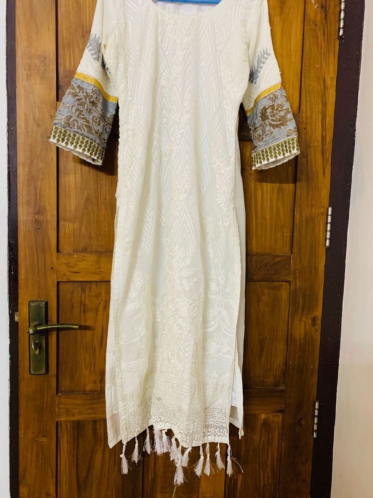 white Pakistani suit