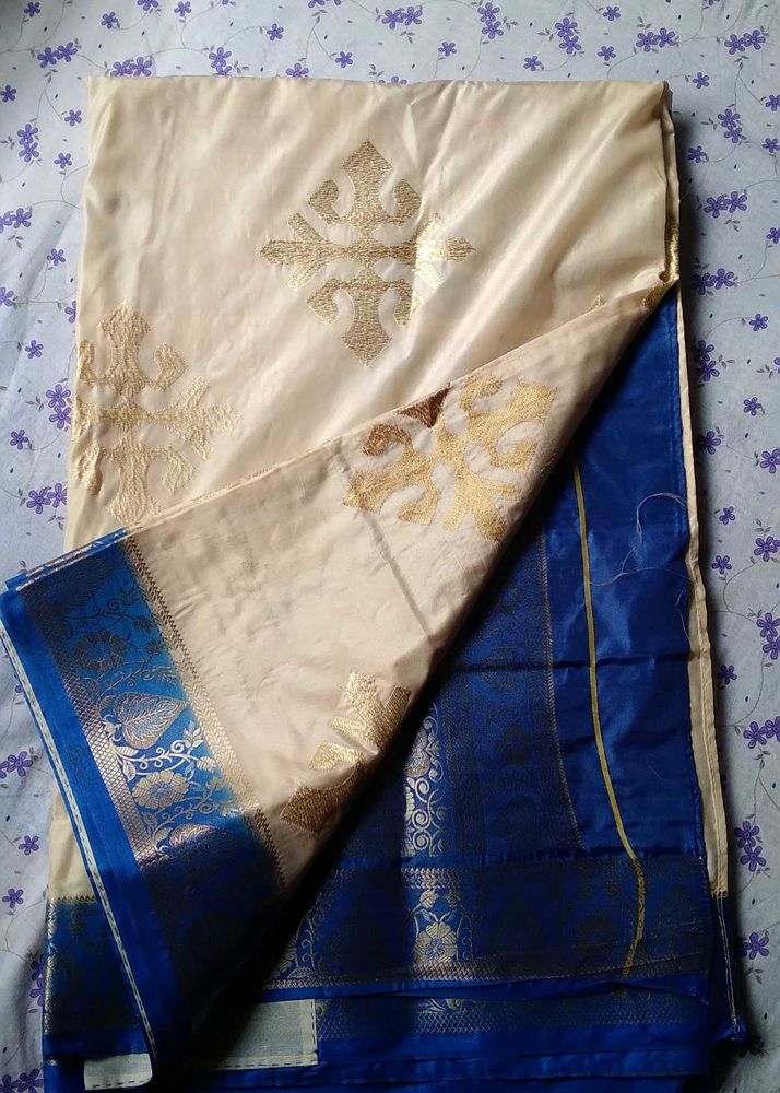 PUJA WEAR GORGEOUS WHITE AND ROYAL BLUE SAREE
