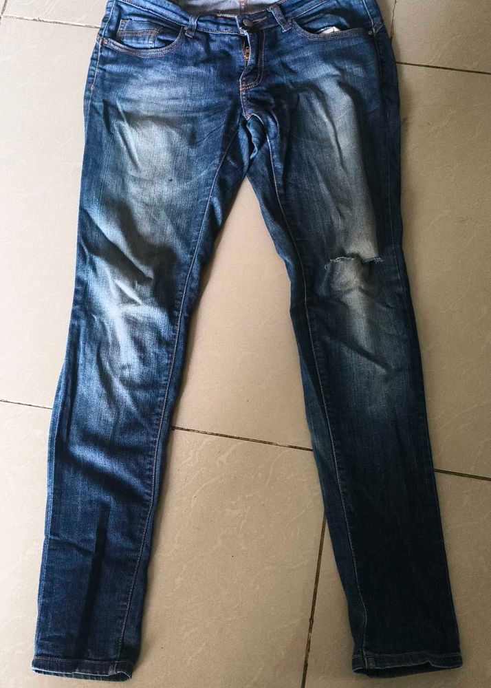 Distressed Denim Jeans