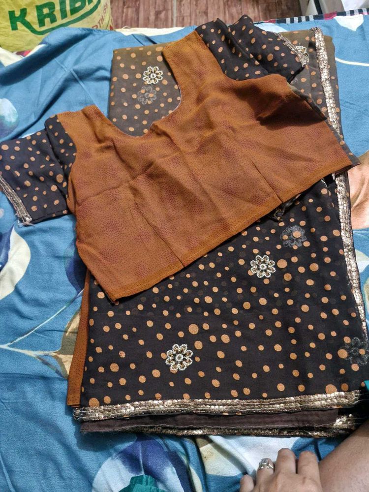 Saree With Stiched Blouse