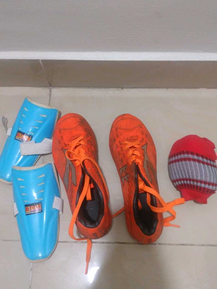 Orange Soccer Cleats with Guards