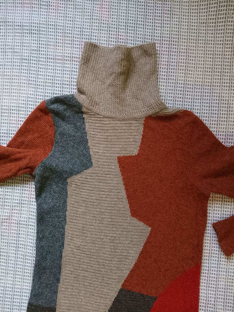 longline woolen turtle neck sweater.