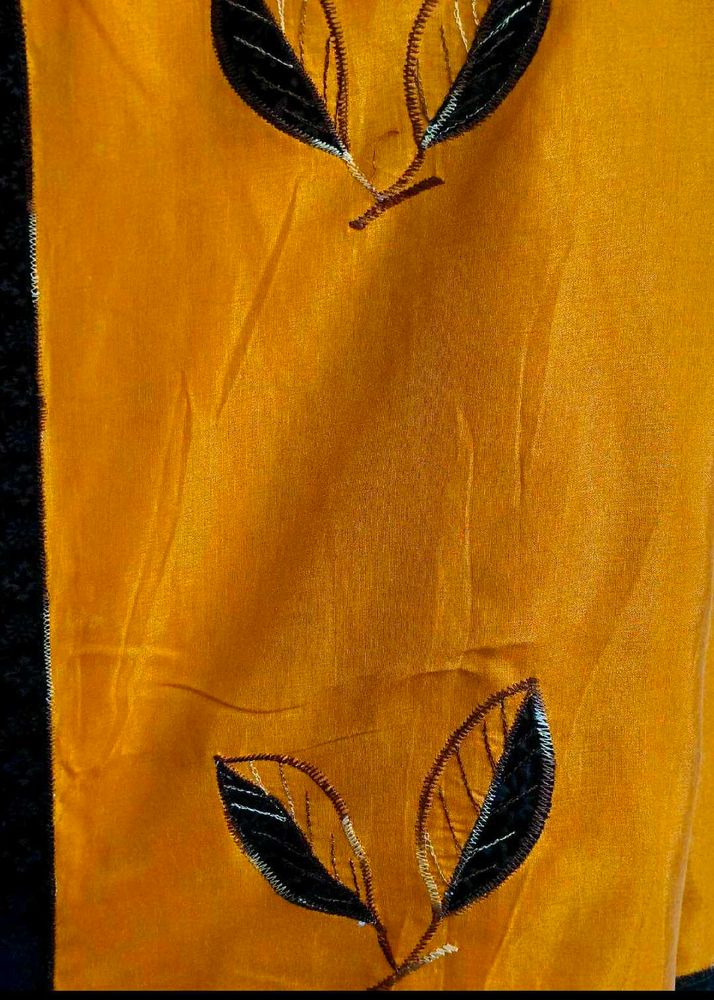 Mustard And Black Embellished Saree