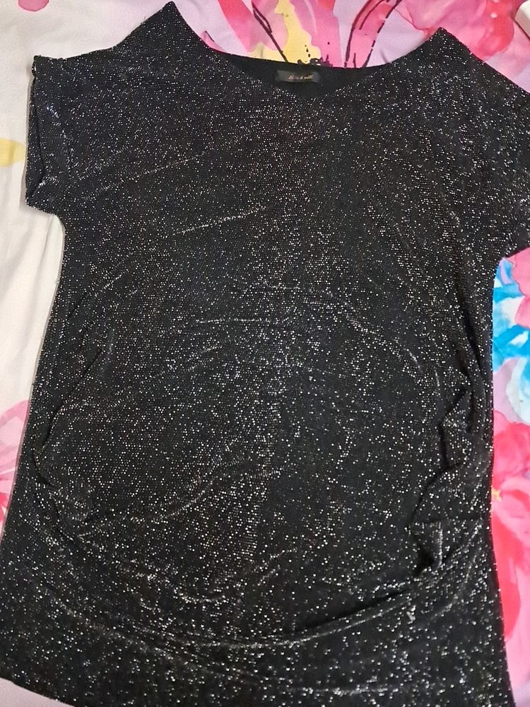 This is a party wear dress which you can wea