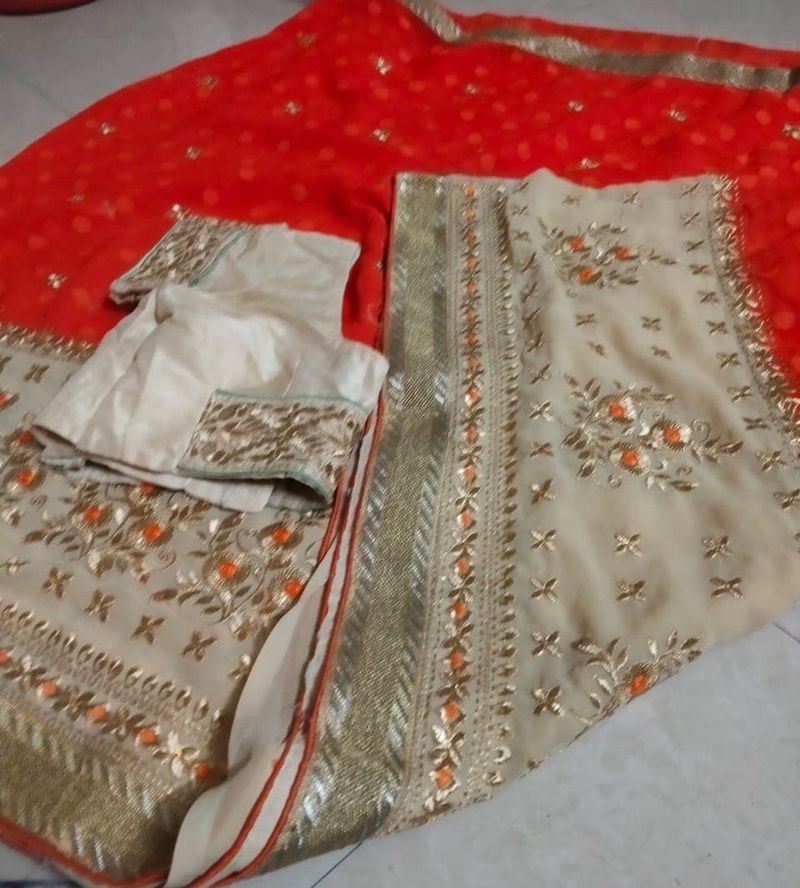 Embroidered net saree with blouse