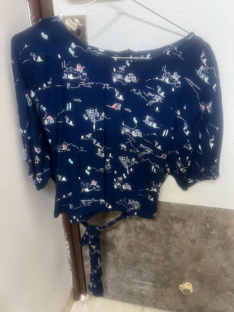 Blue Top With White Graphics