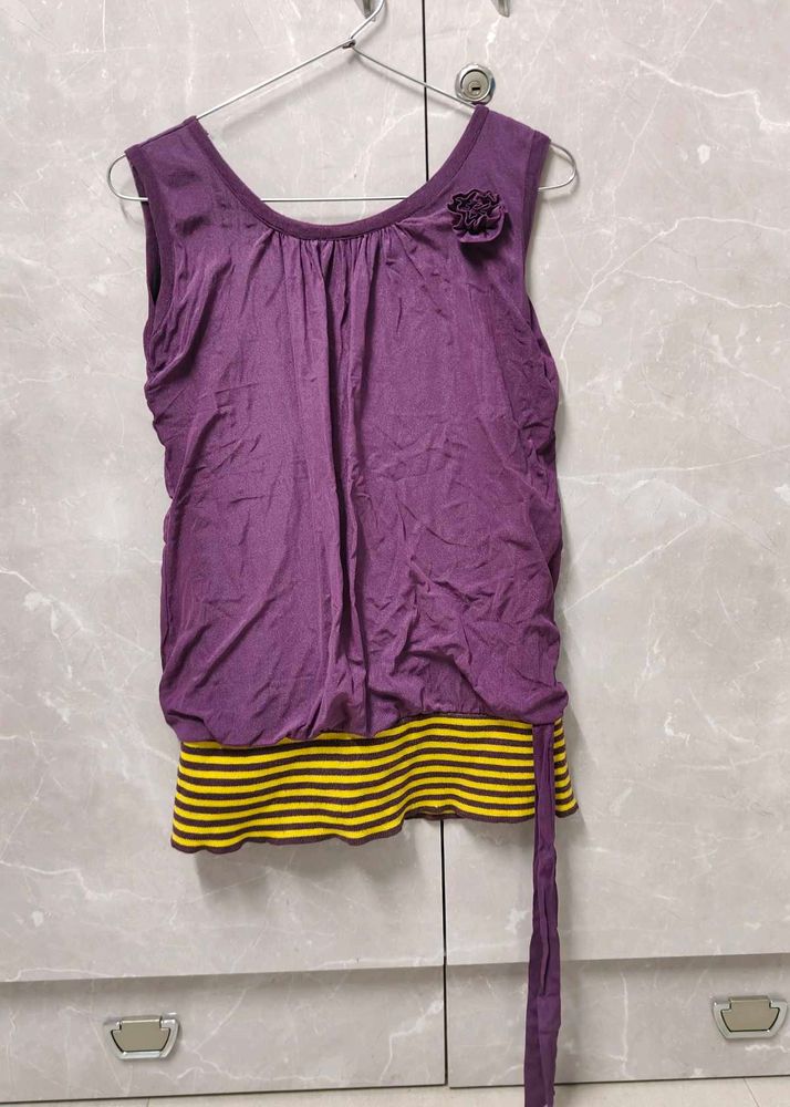 Sliveless Top