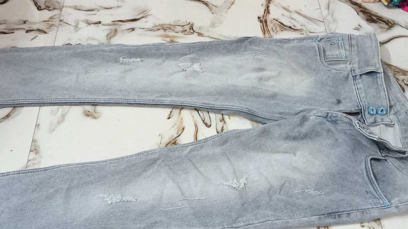 Distressed Gray Denim Jeans