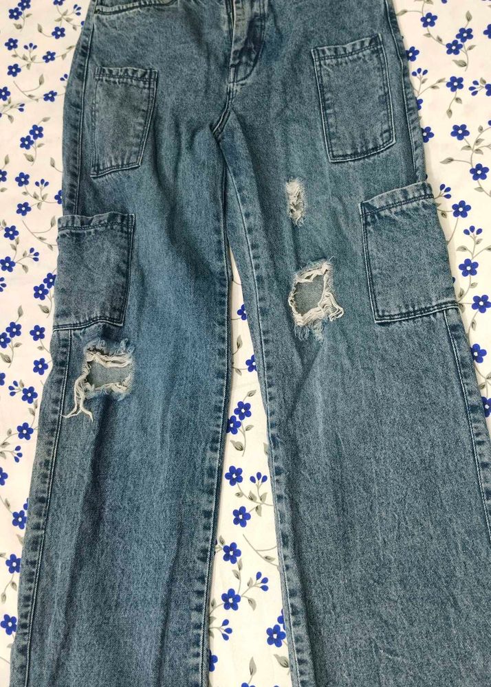 dark blue ripped jeans