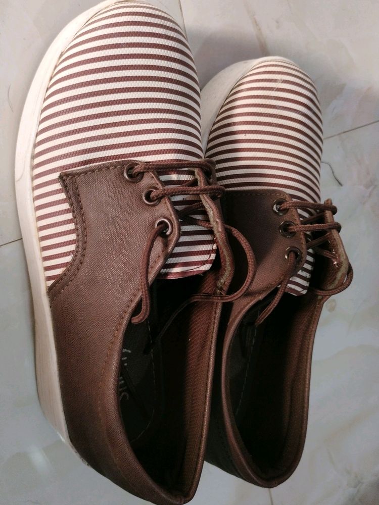 Brown platform shoes