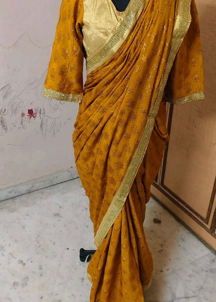 Elegant Mustard Saree with Gold Border