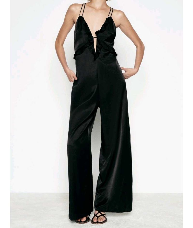 WIDE-LEG JUMPSUIT WITH RUFFLES