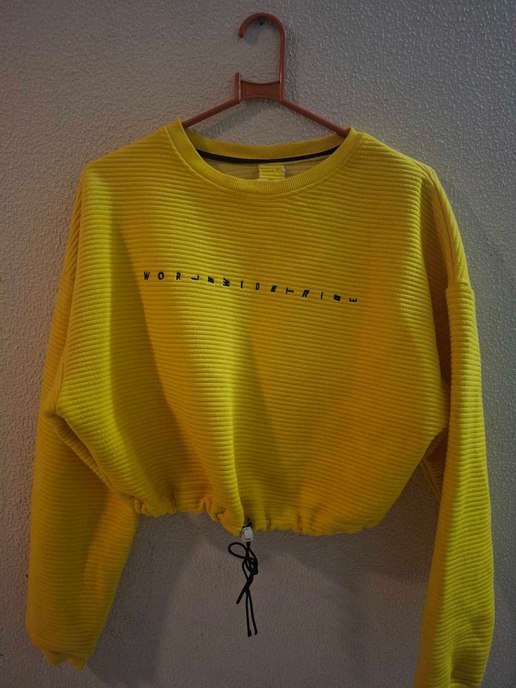 yellow cropped sweatshirt