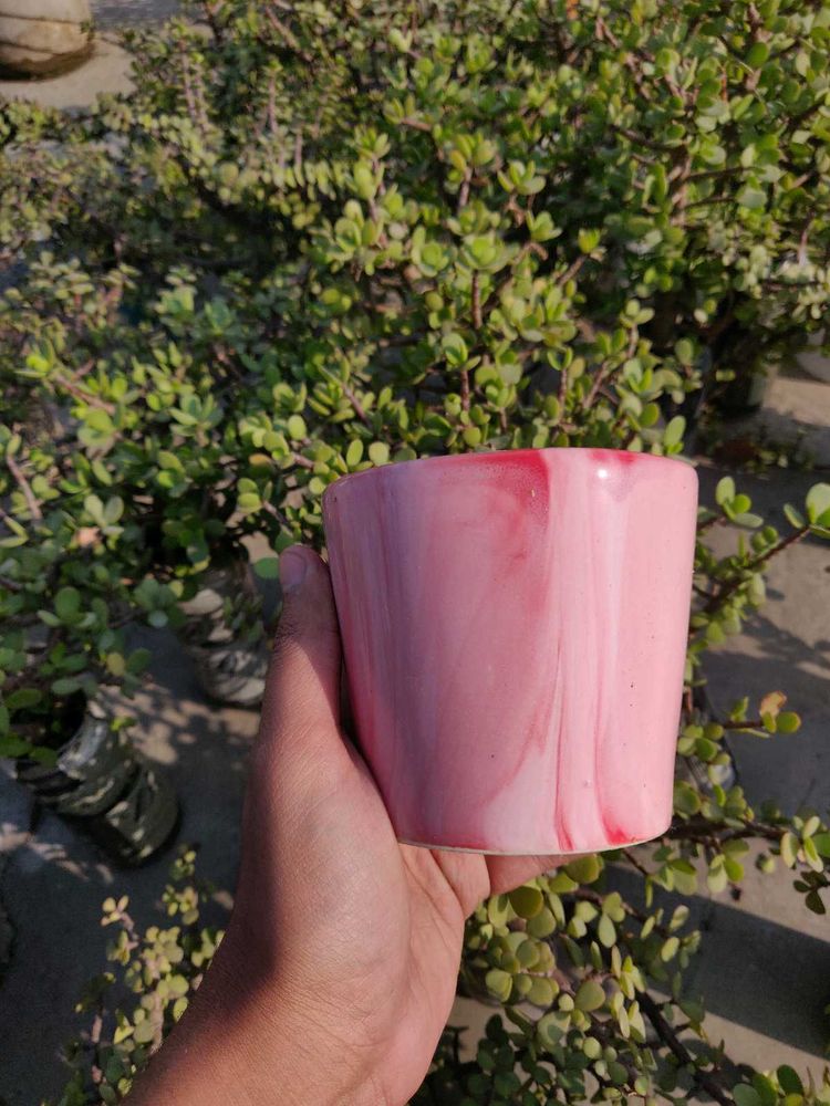 Beautiful Red Planter With Flow Design