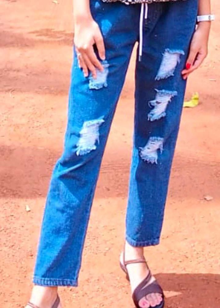 Distressed Denim Jeans