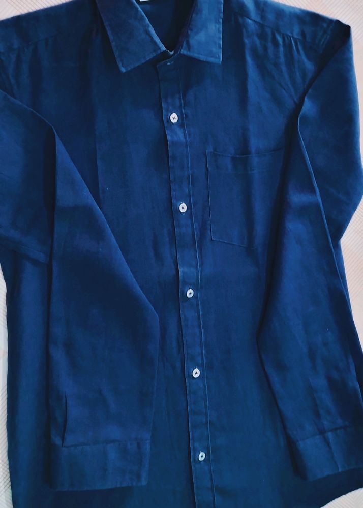 men shirt, solid blue colour, size- chest-26. 5&#34;, length -34&#34;, shoulder -16.5&#34;