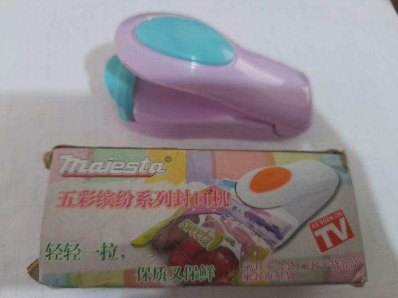 PACKET SEALING MACHINE