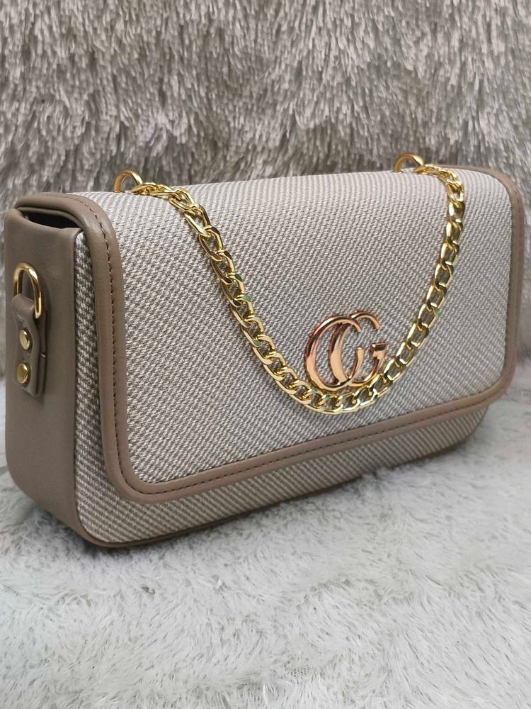 Chic Crossbody Bag with Chain Detail