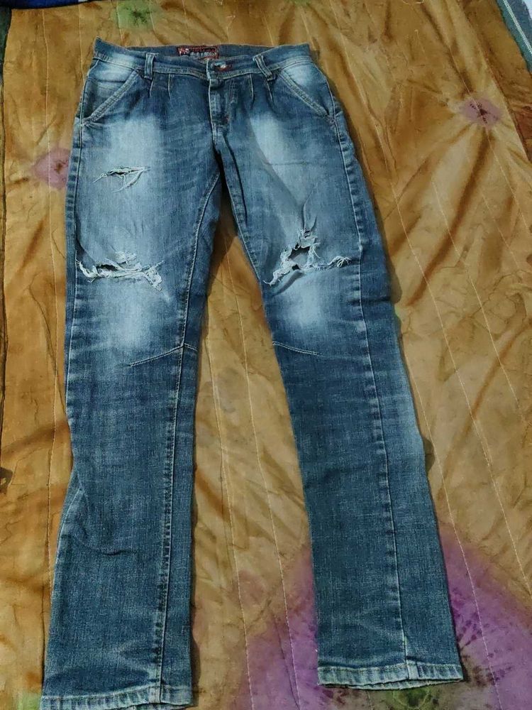 Ripped Blue Denim Jeans