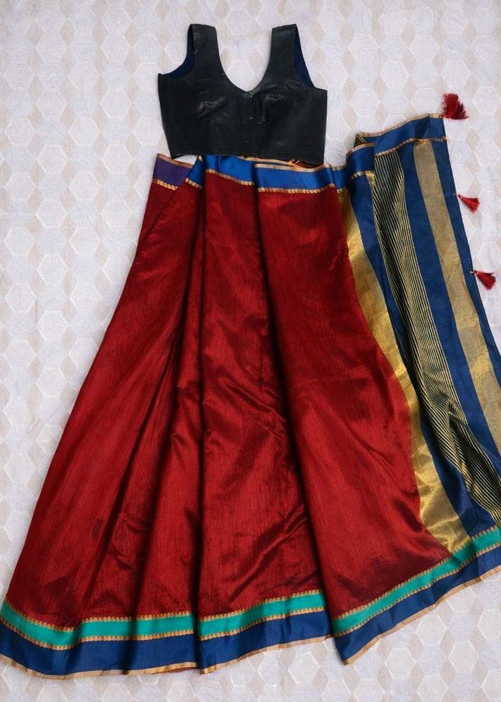beutiful maroon saree with sleeveless blouse