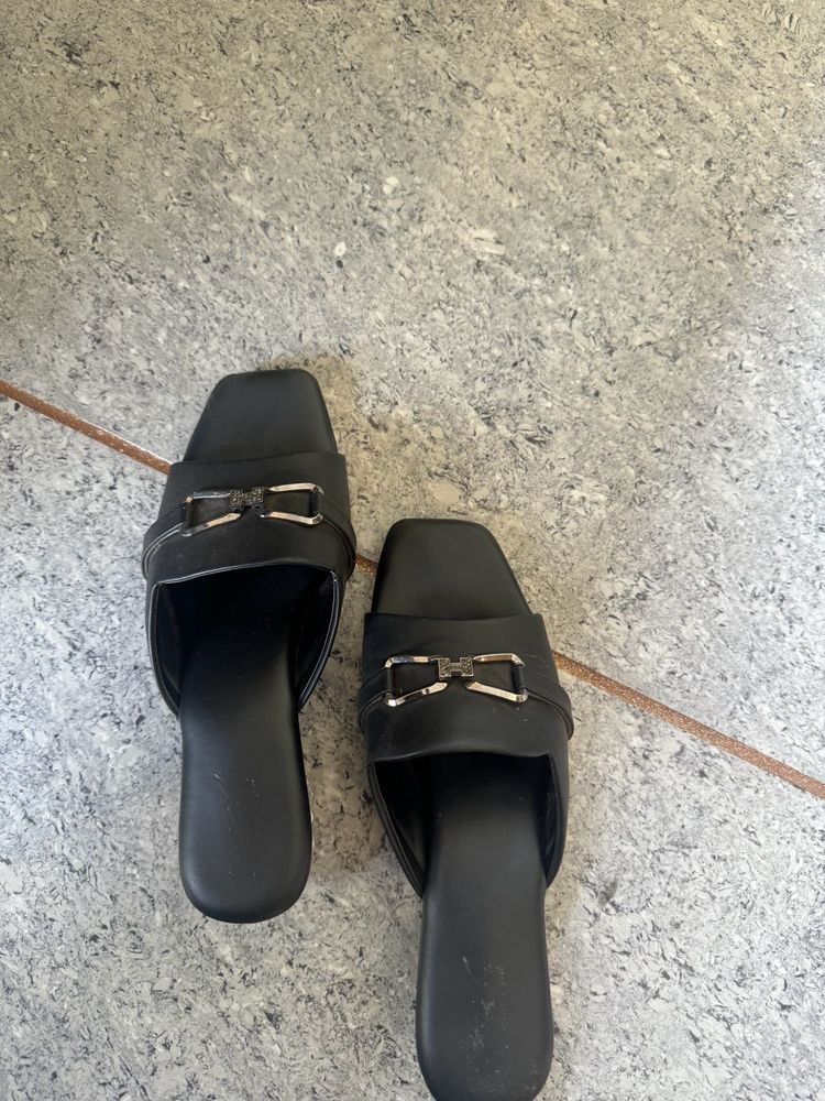 black chappal
