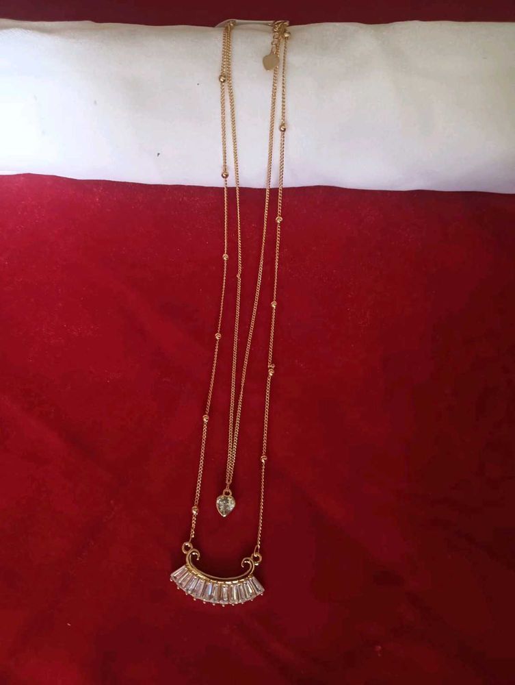 Gold Layered Necklace with Charm Detail