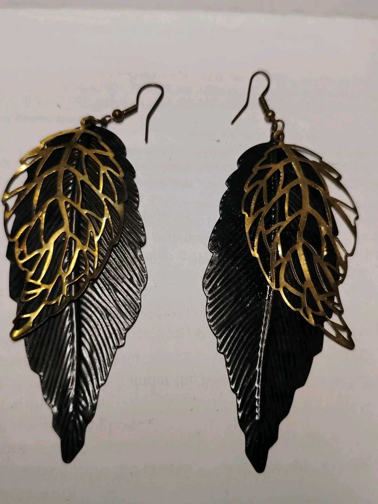 black and golden earrings